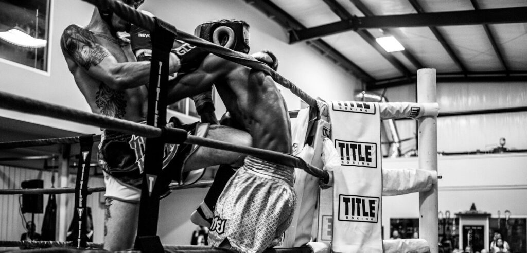 grayscale photography of boxing
