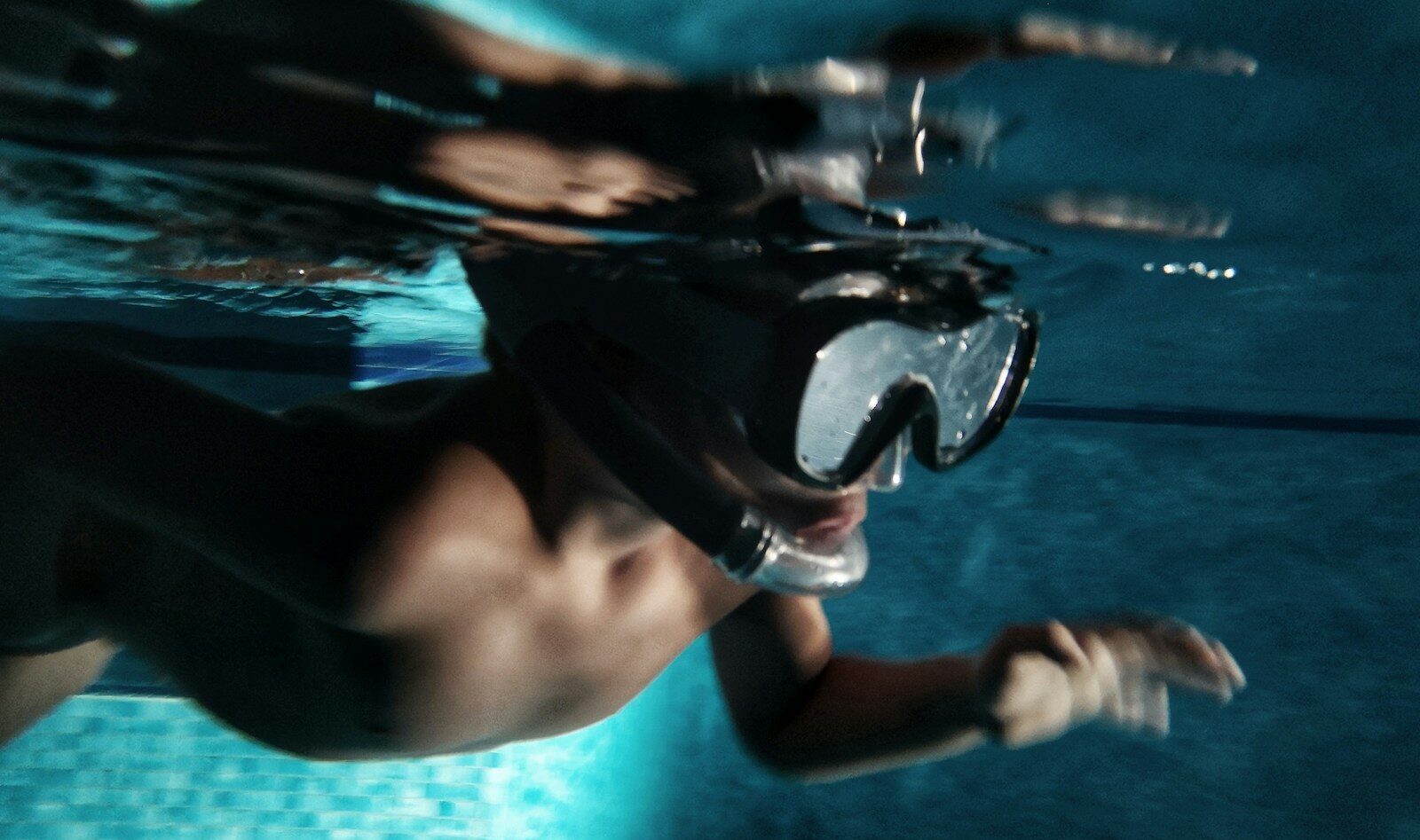 unknown person swimming